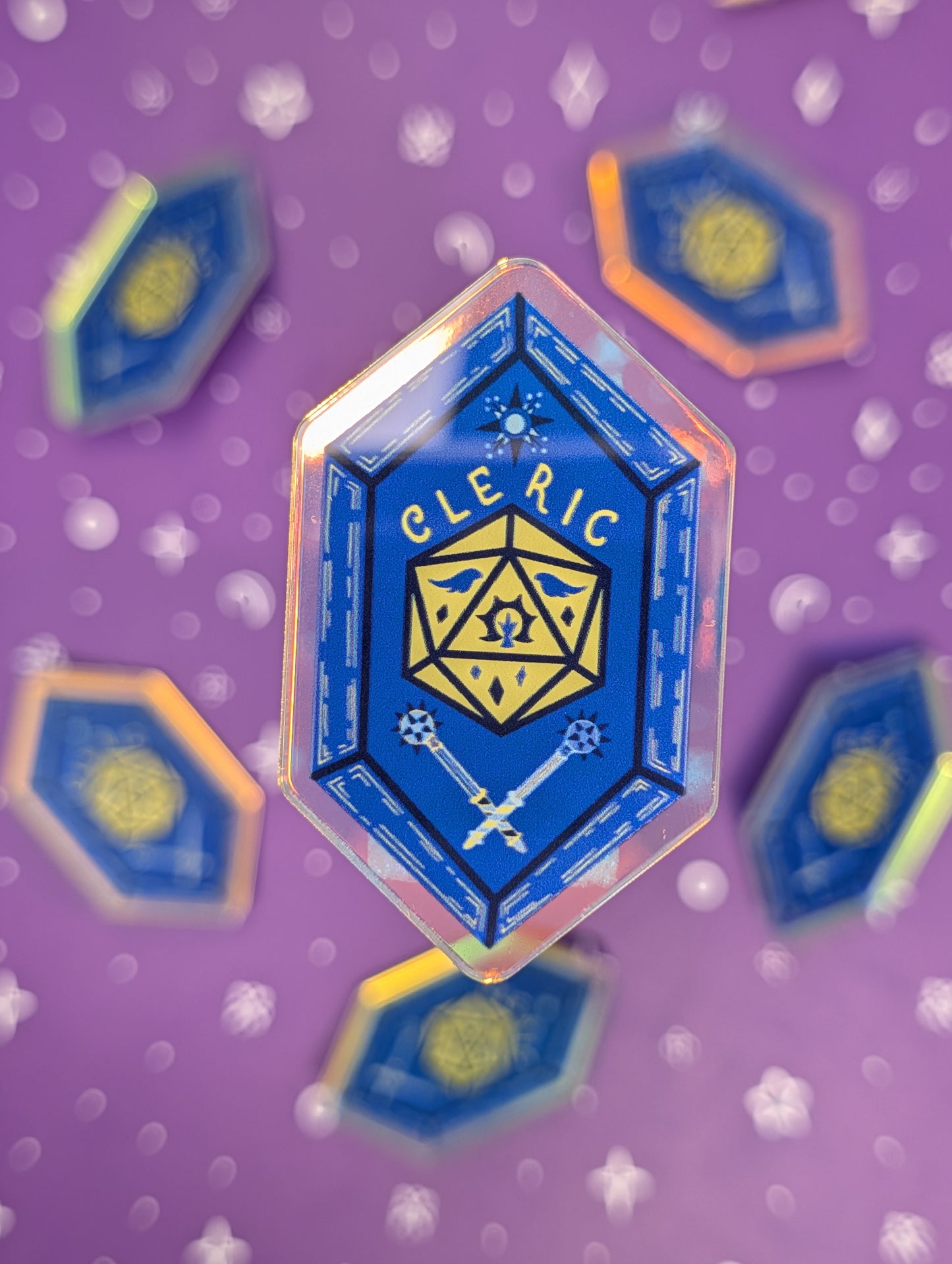 Hexagonal 'Cleric' badge with blue and yellow design on a purple background