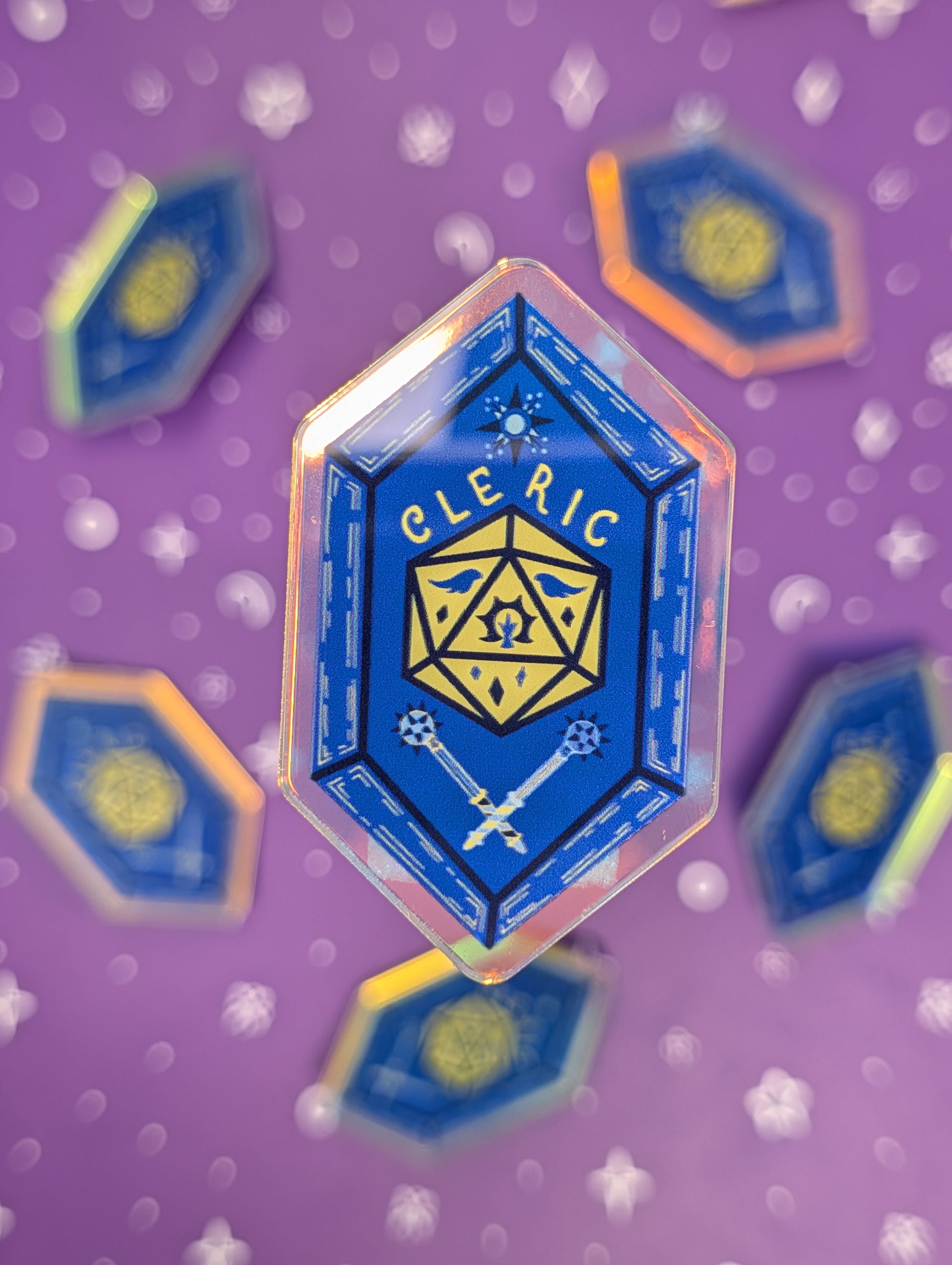 Hexagonal 'Cleric' badge with blue and yellow design on a purple background